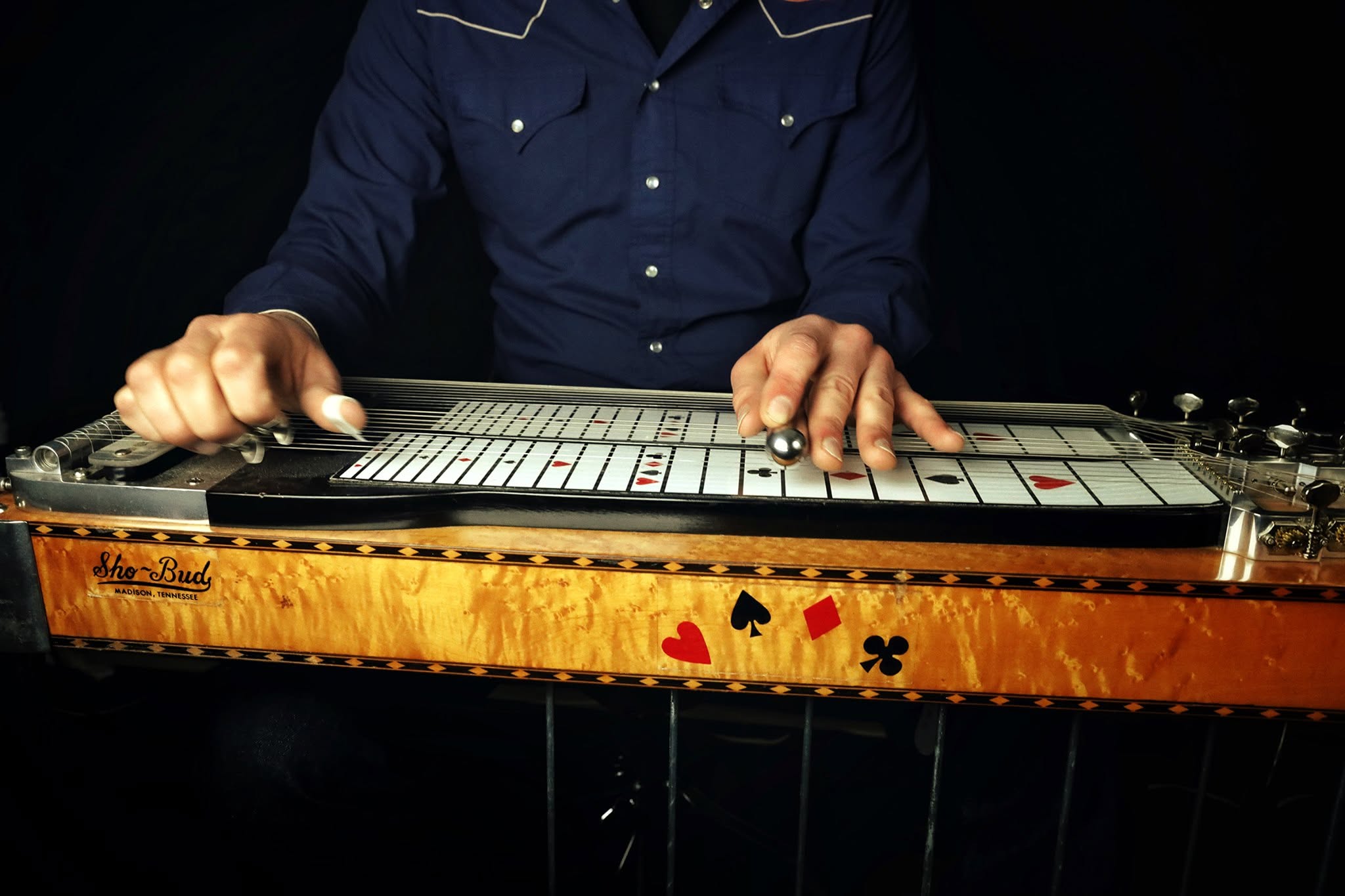 A close-up of Tebbs playing his Sho-Bud pedal steel guitar